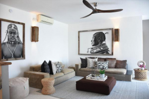 Imani Penthouse - Beachfront 2-Bed with Panoramic Ocean Views